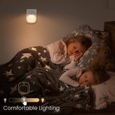 Close-up of the battery-powered motion sensor night light, showing its compact and sleek design